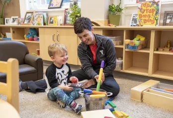 Boy and Staff in Child Care