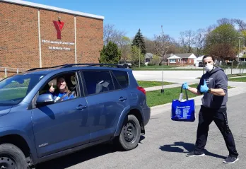 Y Staff Members prepare to deliver care packages to Sarnia residents at the Y Learning and Careers Centre.