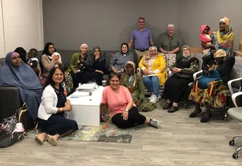 Andrew Lockie, CEO and Jacquie Rumiel VP Newcomer & Community Services visit the Newcomer Women’s Group at the YMCA Windsor Learning Centre.