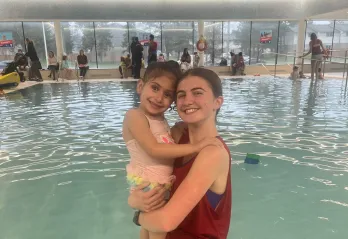 Child and Instructor in Pool