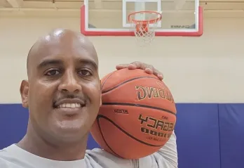 Robel playing basketball