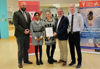 From left: MPP Terence Kernaghan with the YMCA’s Chitra Sreekumar, Alax Brown, Andrew Lockie, and Denis Giles