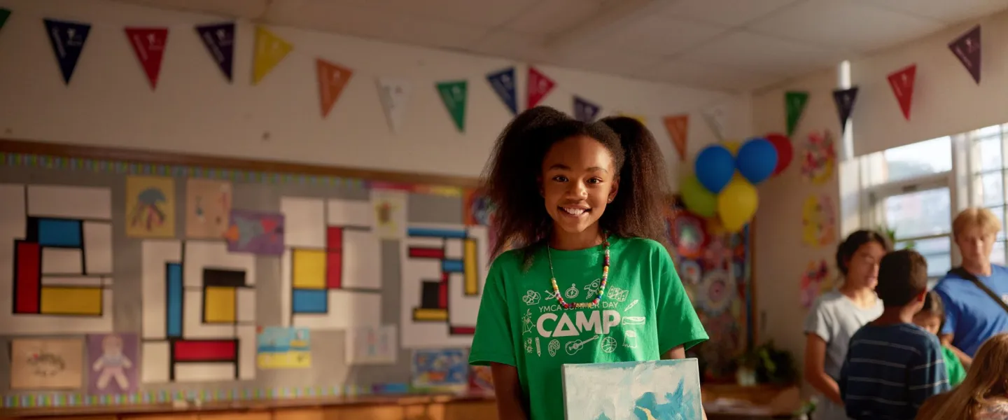 Girl at YMCA camp, in classroom