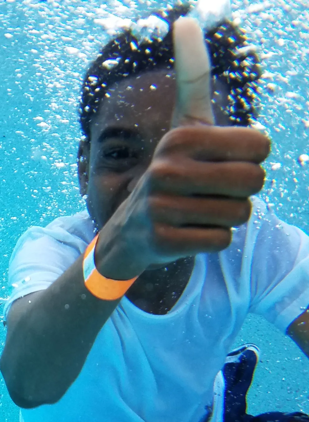 Boy Underwater Swimming
