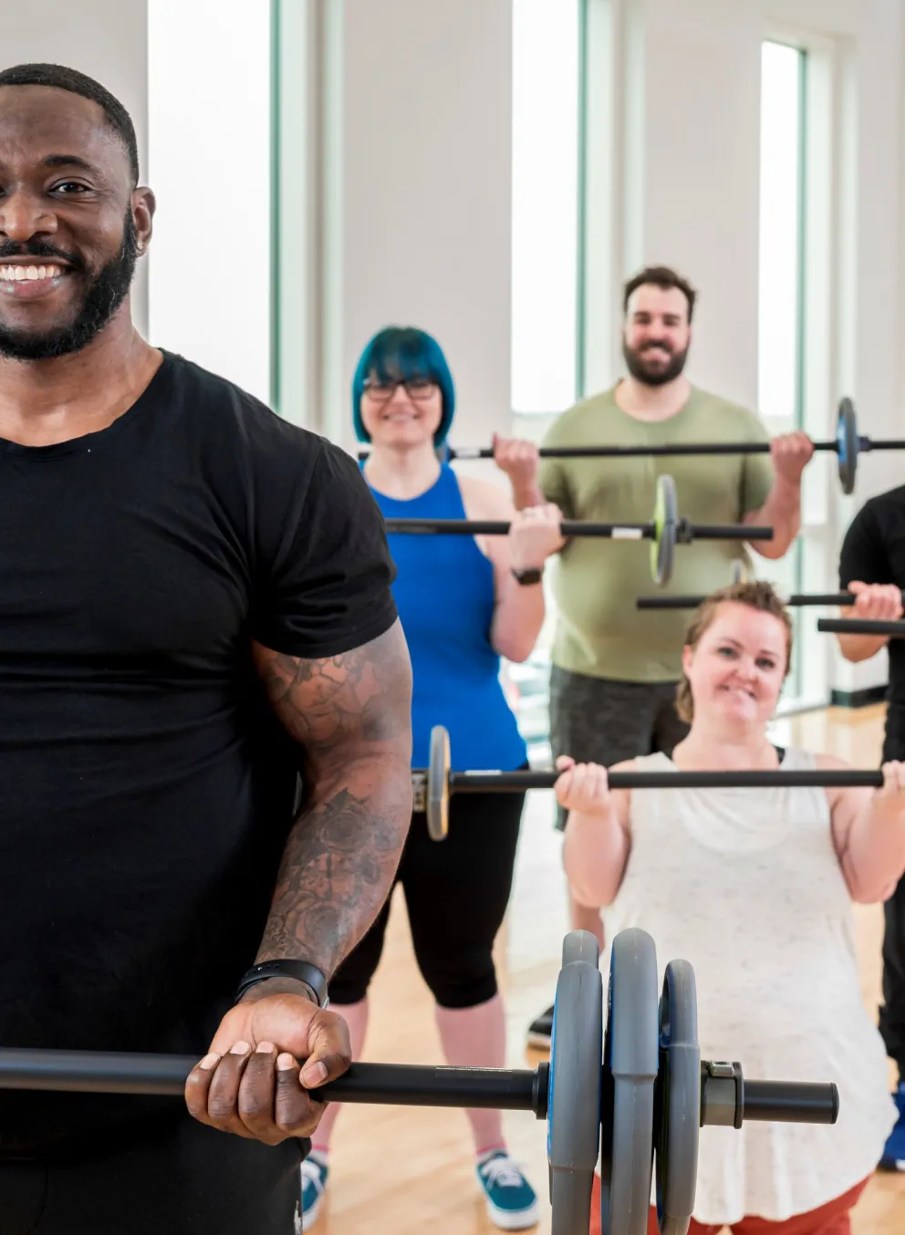 Group working out in group fitness class