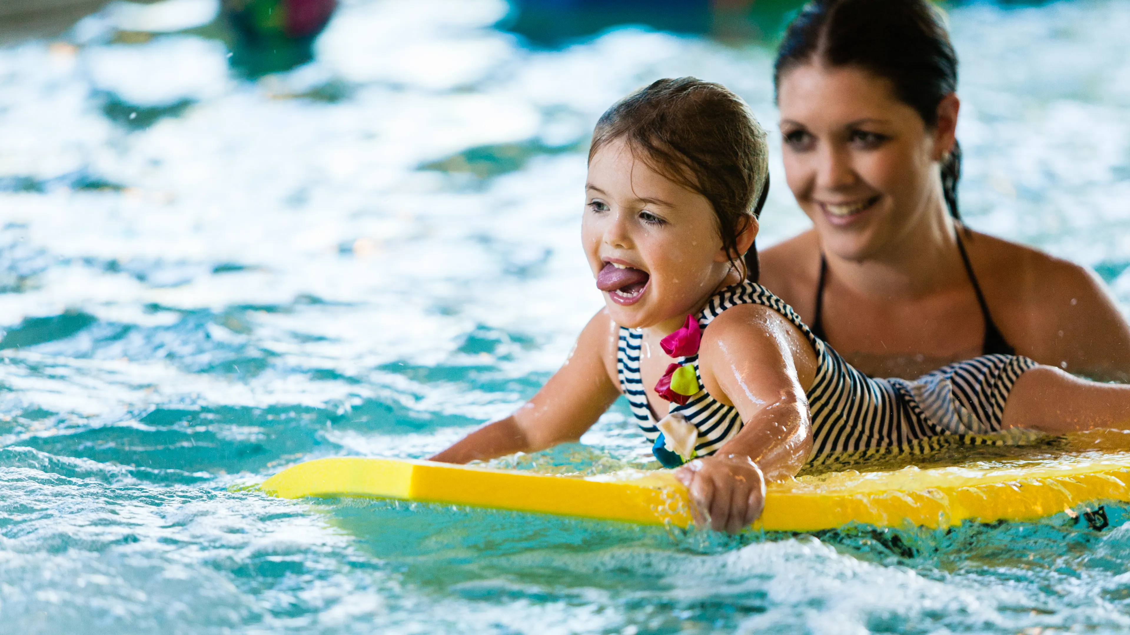 Family Swimming in Pool