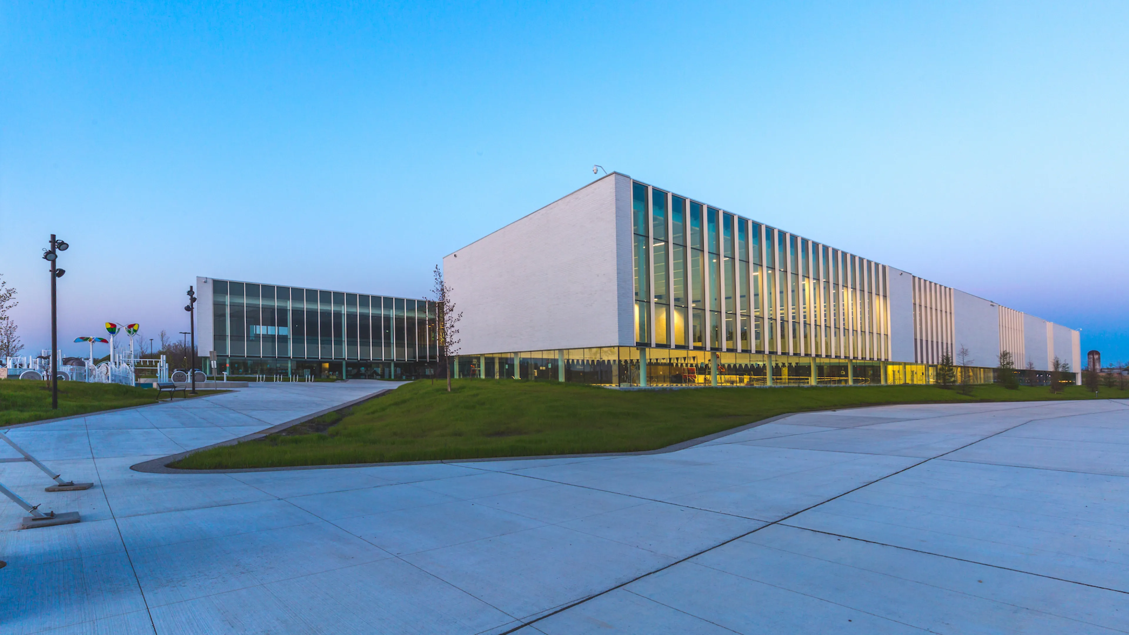 The outside of the Bostwick YMCA facility at dusk.