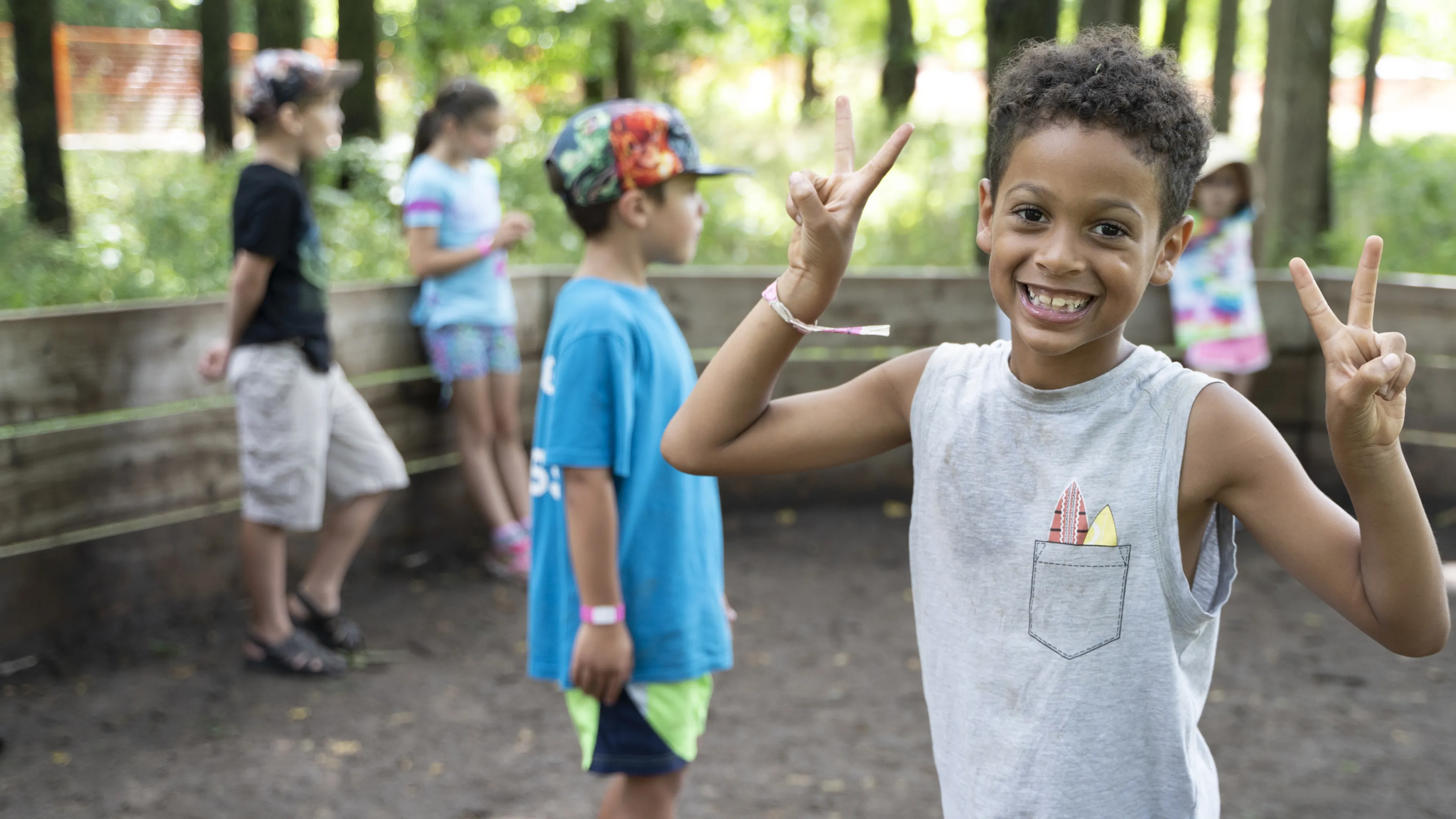 Boy smiling enjoying camp