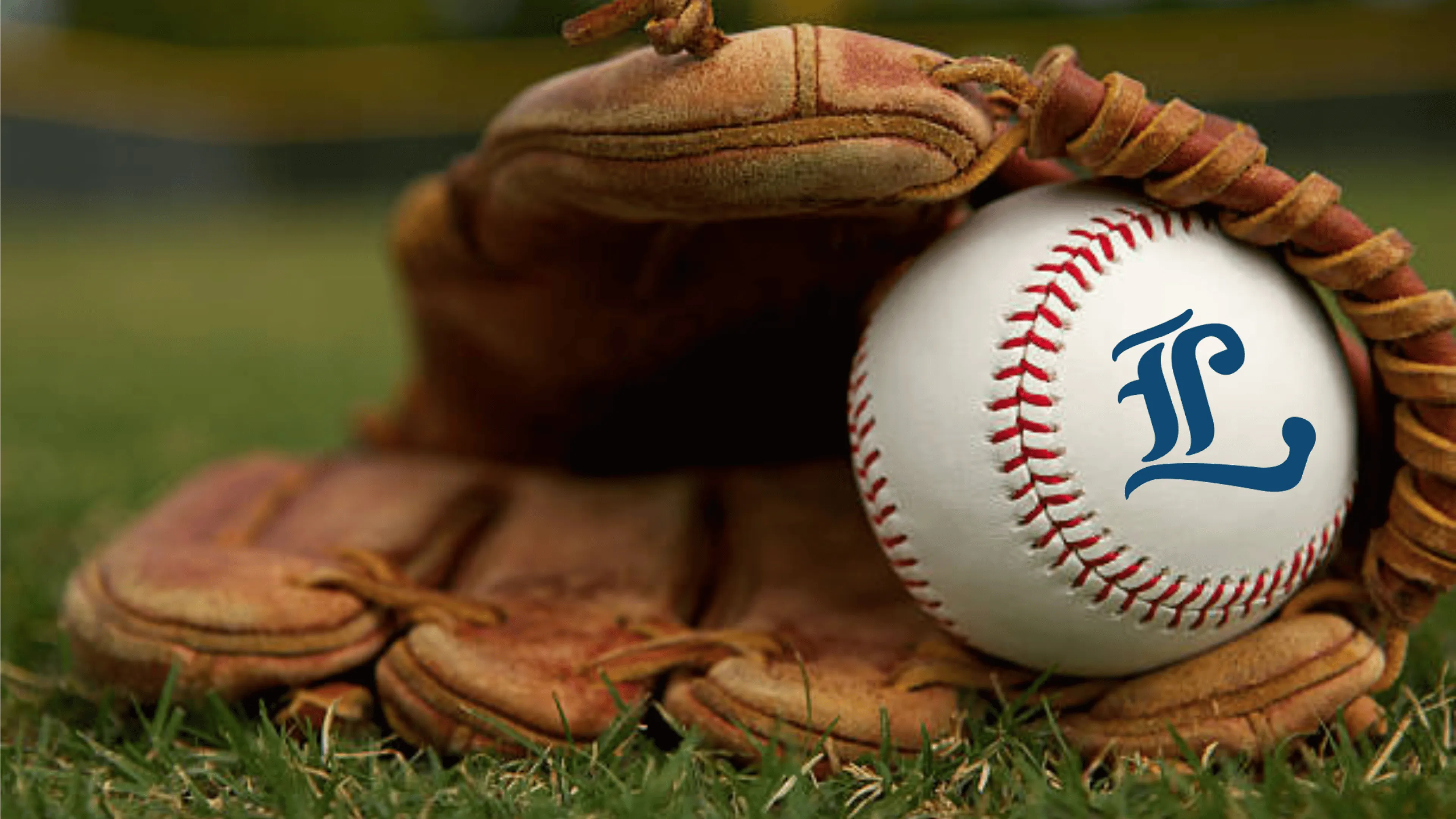 Baseball glove with London Majors ball in it