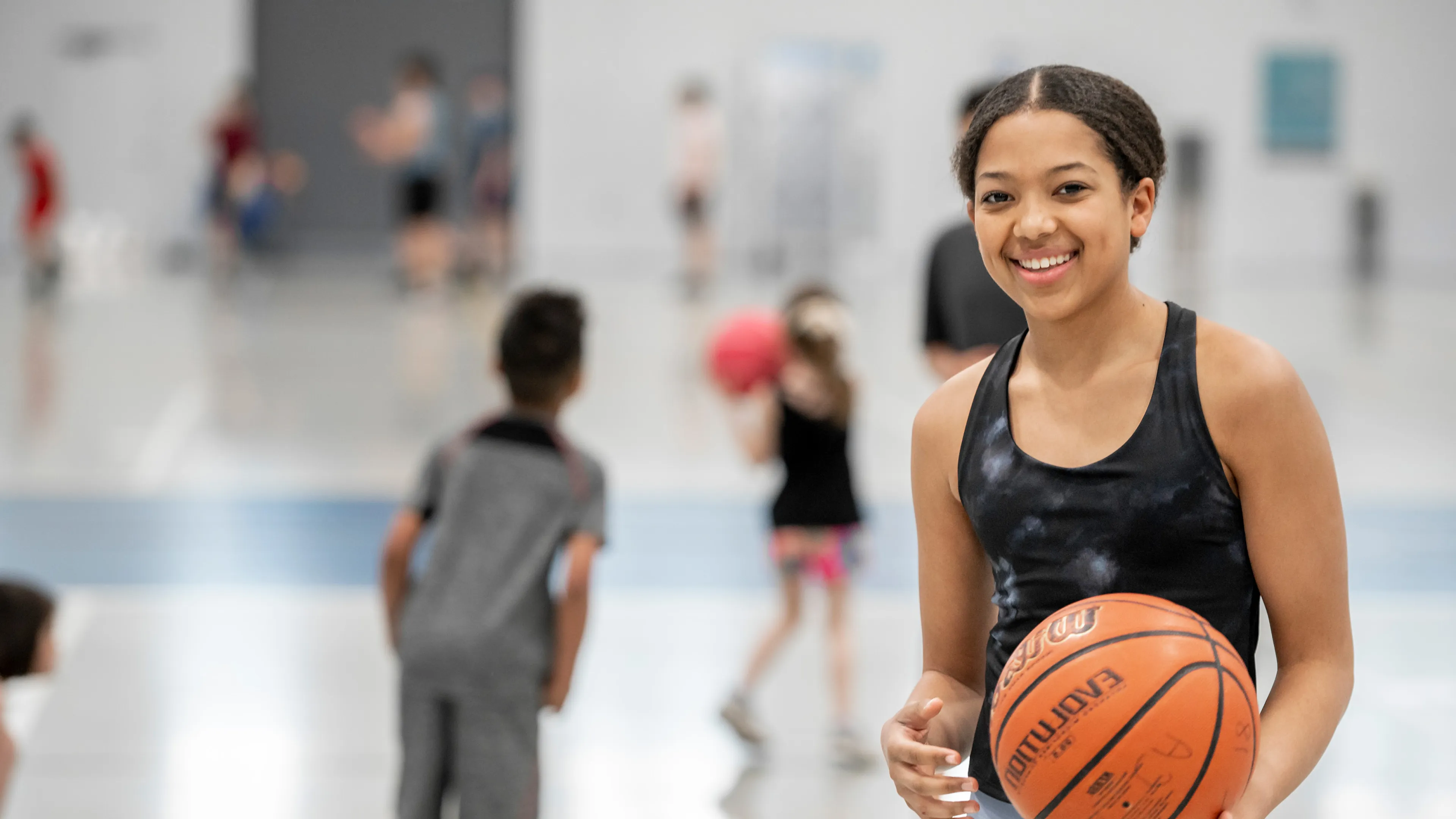 Girl holding basketball