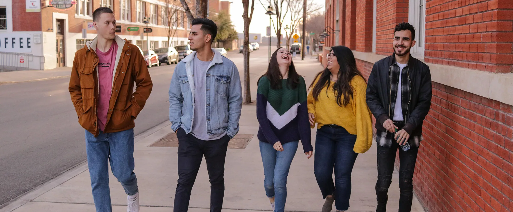 Teens walking down street