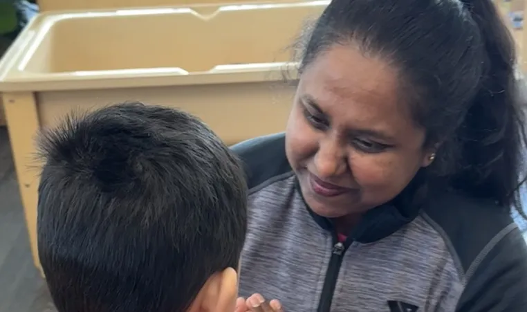 Educator with child