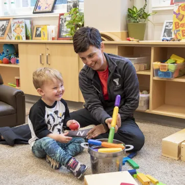 Boy and Staff in Child Care