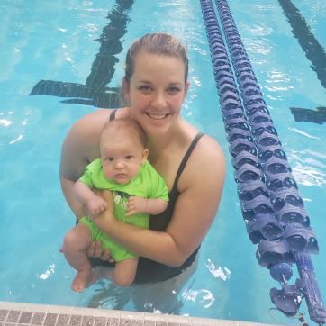 Julie holds her 4 month old son Joey in the St. Thomas YMCA pool.