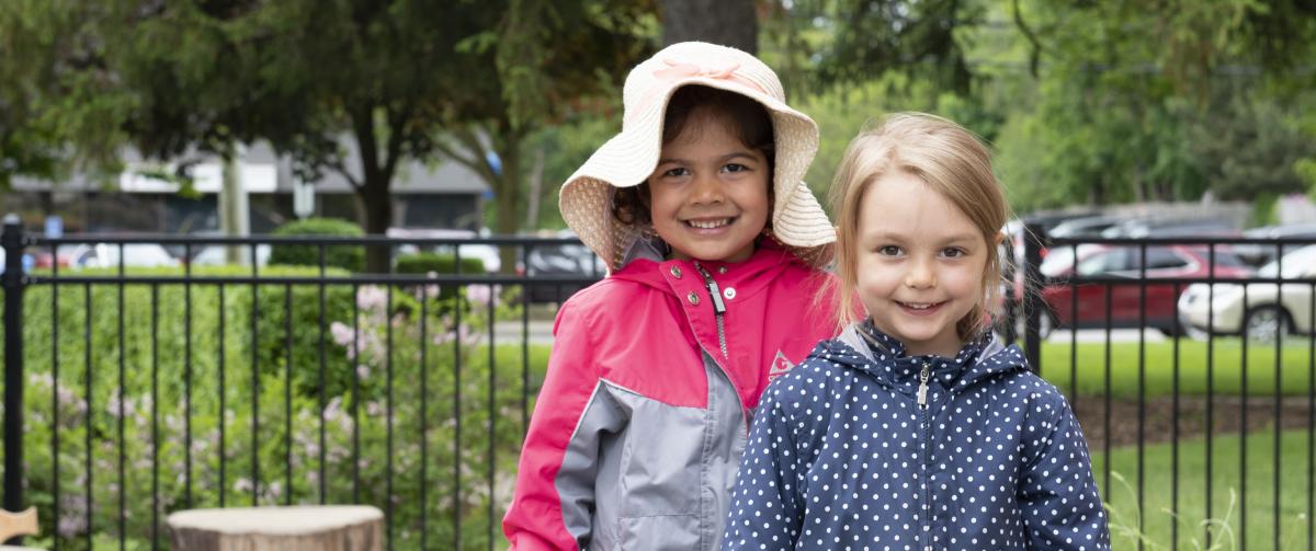 Two girls playing outside during after care