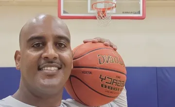 Robel playing basketball