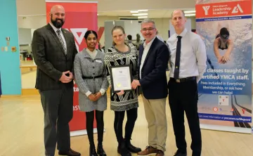From left: MPP Terence Kernaghan with the YMCA’s Chitra Sreekumar, Alax Brown, Andrew Lockie, and Denis Giles